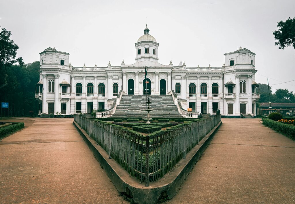 Elegant architectural view of Tajhat Palace in Rangpur, Bangladesh, showcasing its pristine beauty.